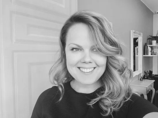 Portrait of Emilia, the founder and lead stylist of Emilia Hair Studio
